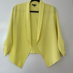 Yellow, lightweight 3/4 sleeve summer jacket.  Hits at waist.